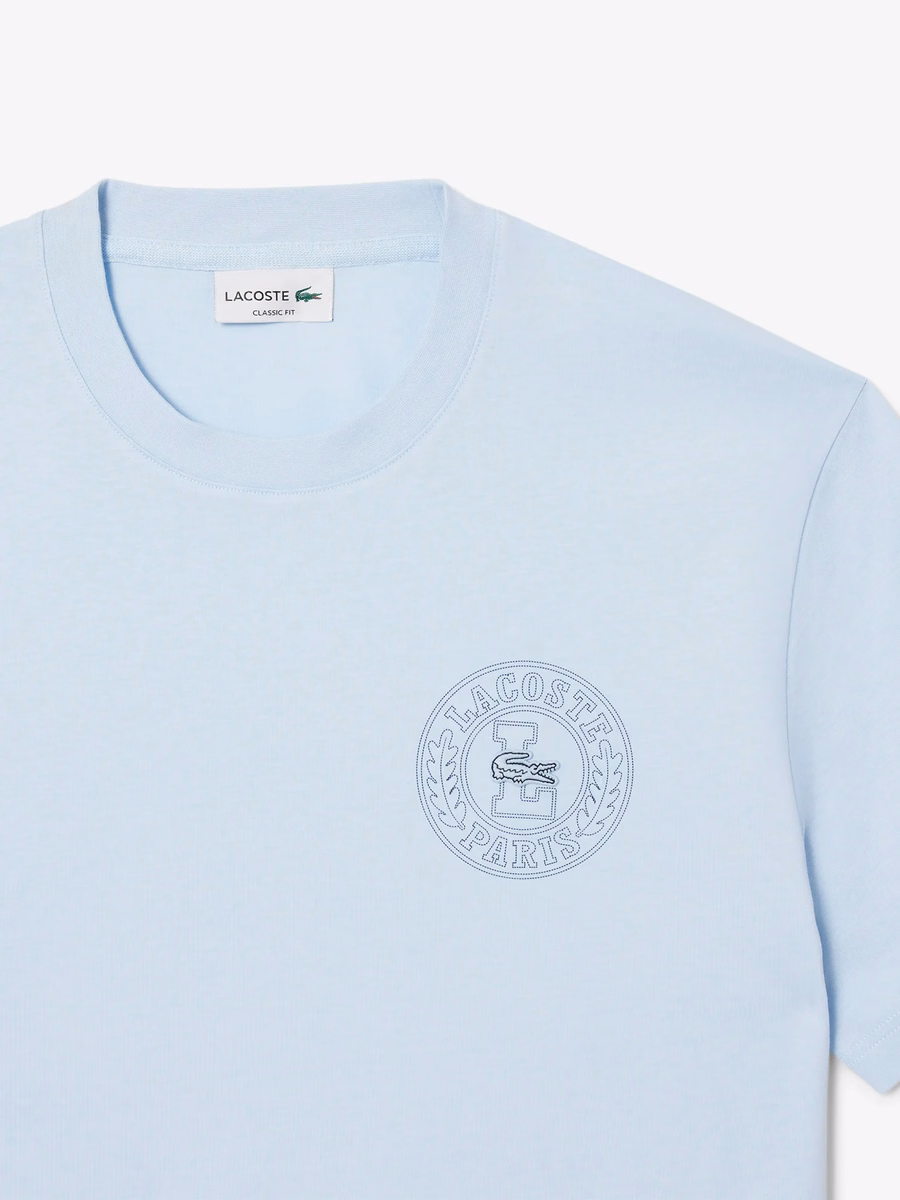 T-shirt con badge stampato