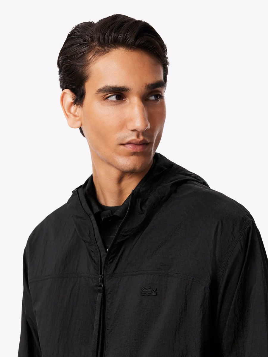 Giacca in nylon ripiegabile e impermeabile