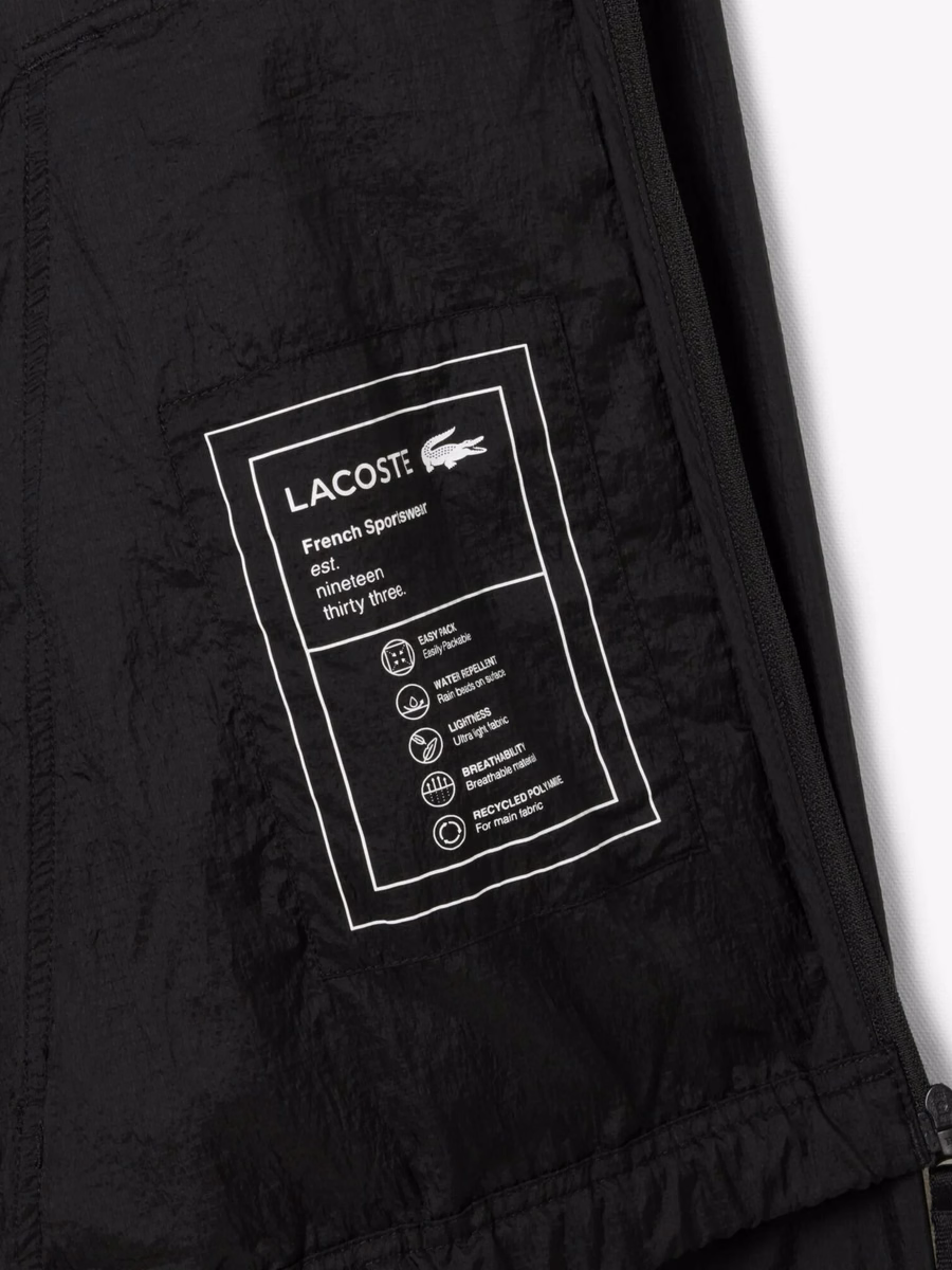 Giacca in nylon ripiegabile e impermeabile